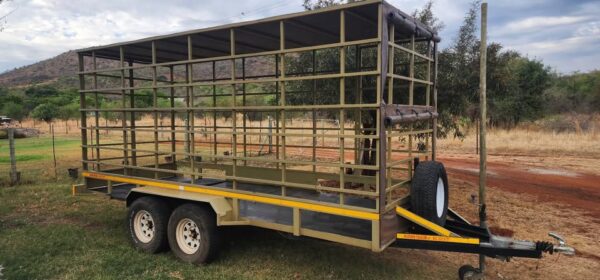 Flat deck with cage double braked axle trailer